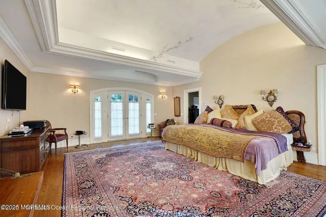 a view of a livingroom with table & chairs