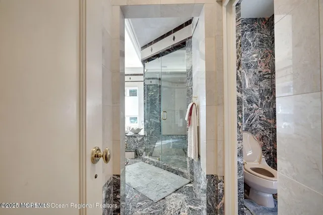 an outdoor space with furniture and umbrella