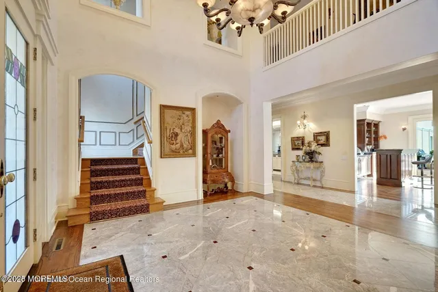 a kitchen with stainless steel appliances kitchen island granite countertop a stove and cabinets