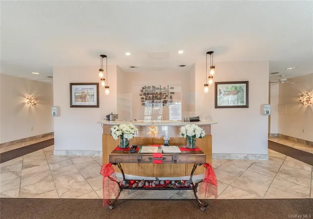 a living room with furniture and a table