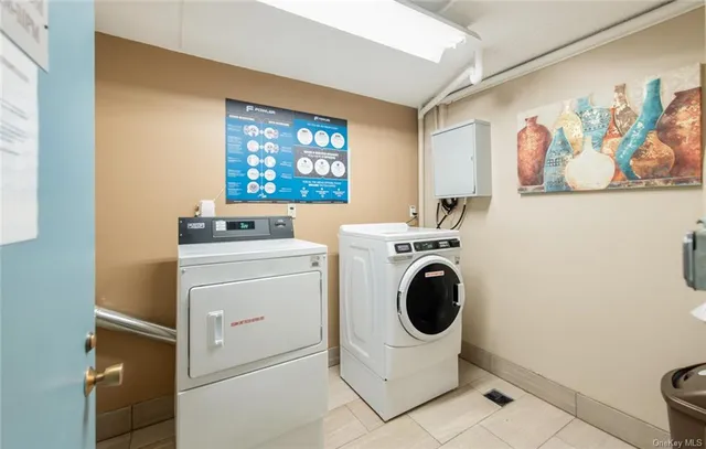 a utility room with dryer and washer