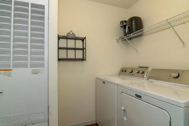 a view of a bathroom from the hallway