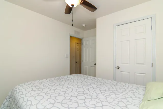 a view of a bathroom from a hallway