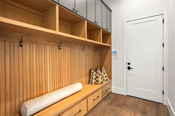 a view of wooden closet and small space