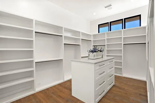 a view of an empty walk in closet
