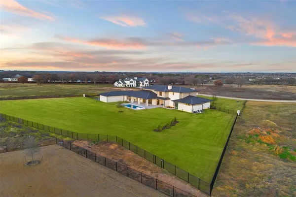 a view of a lake with a big yard