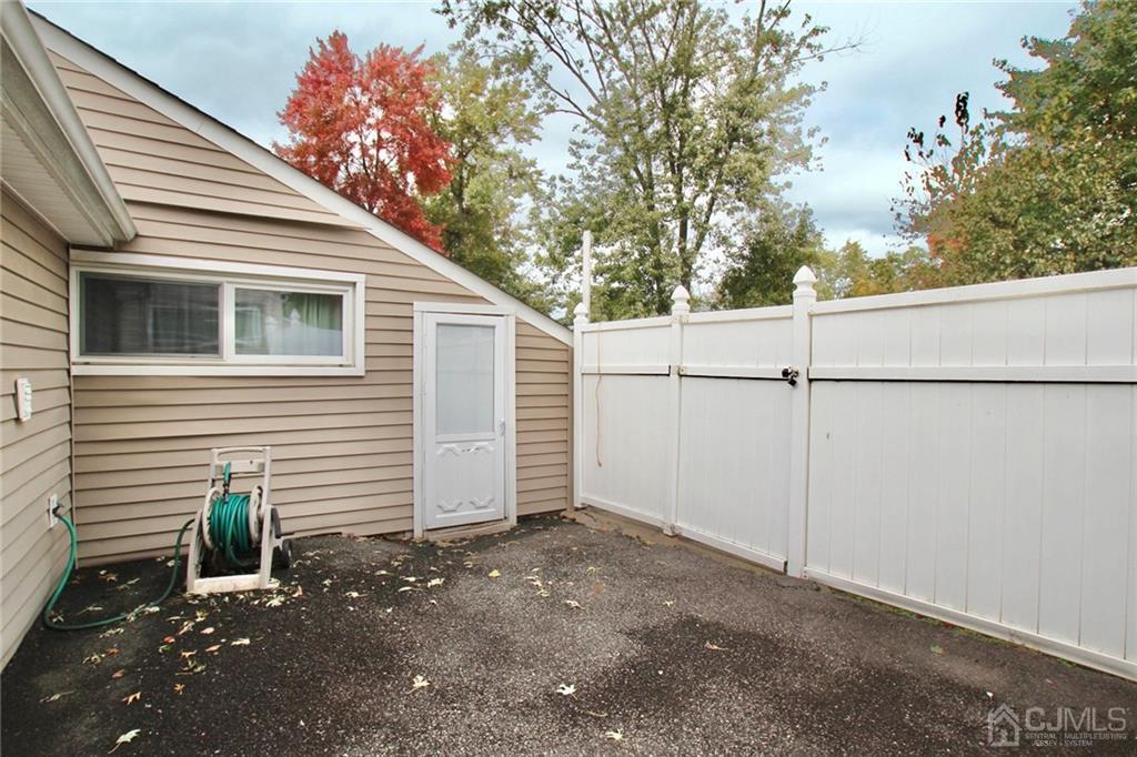 19 Kenmore Road Edison, NJ 08817 - Photo 13 of 13 a view of a house with a garage