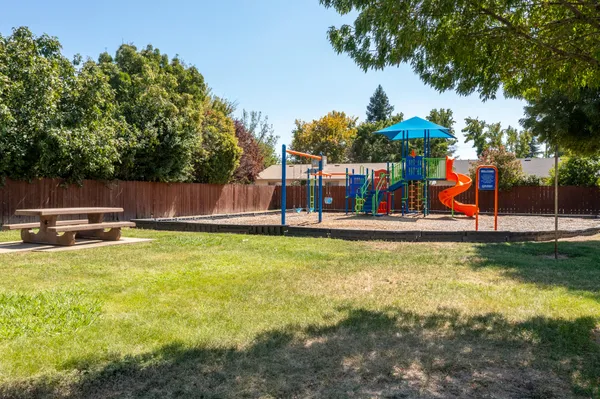 a view of swimming pool with a yard