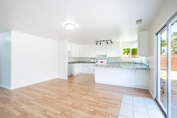 a view of kitchen with wooden floor