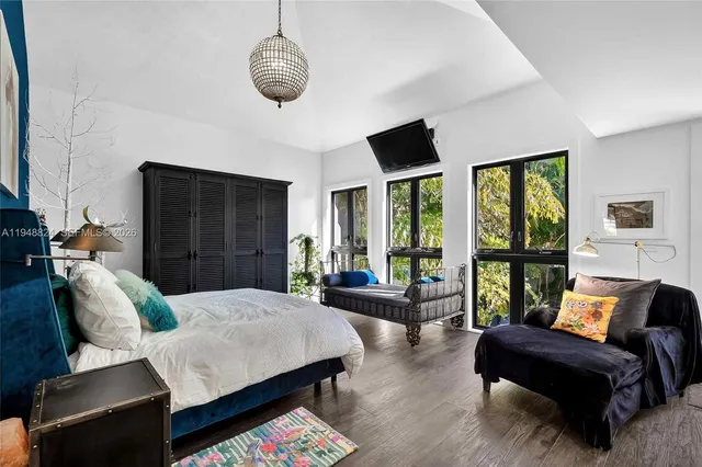 a living room with large windows