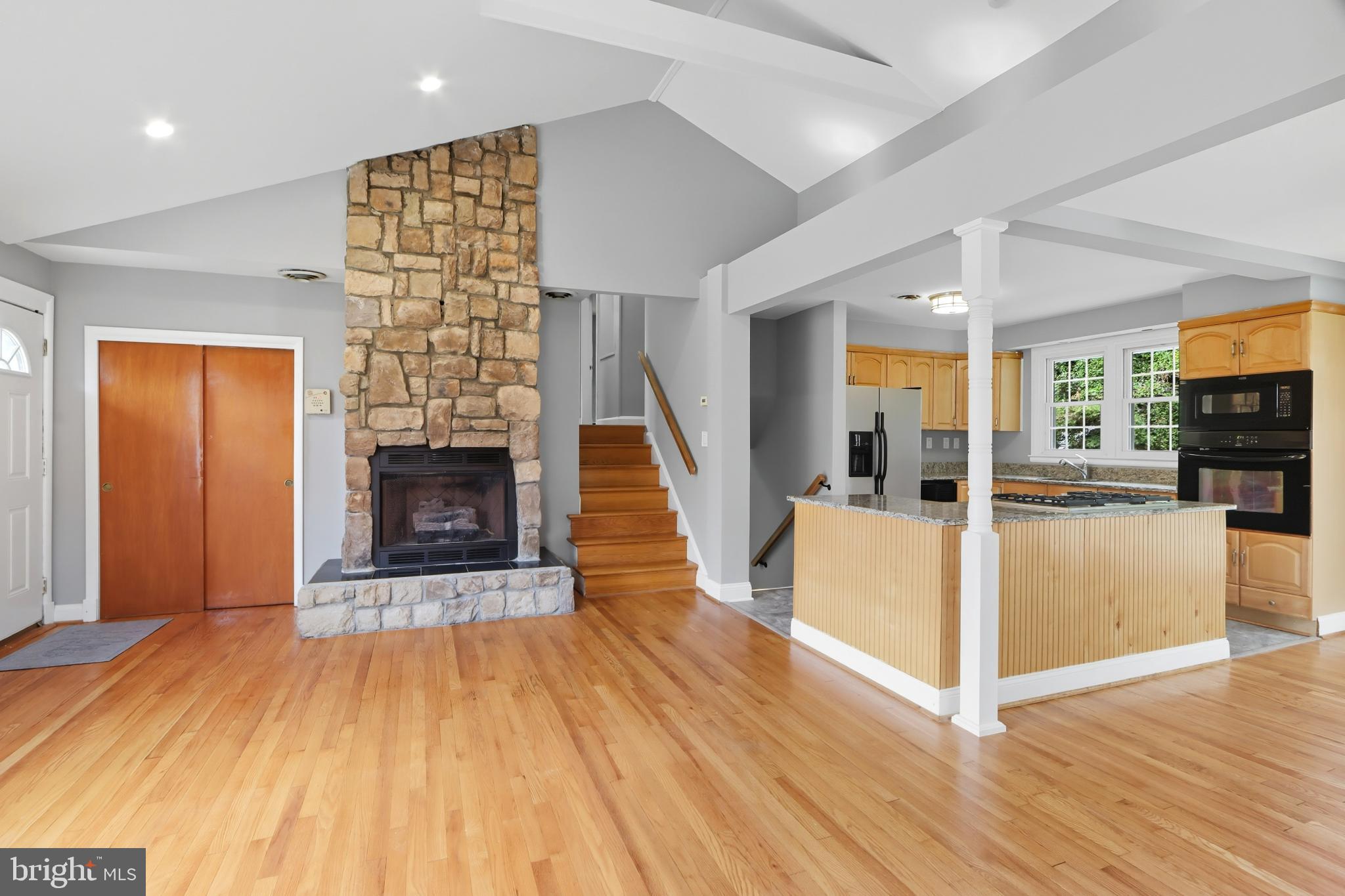 1910 Clifden Road Baltimore, MD 21228 - Photo 4 of 25 Spacious living area with rustic charm.