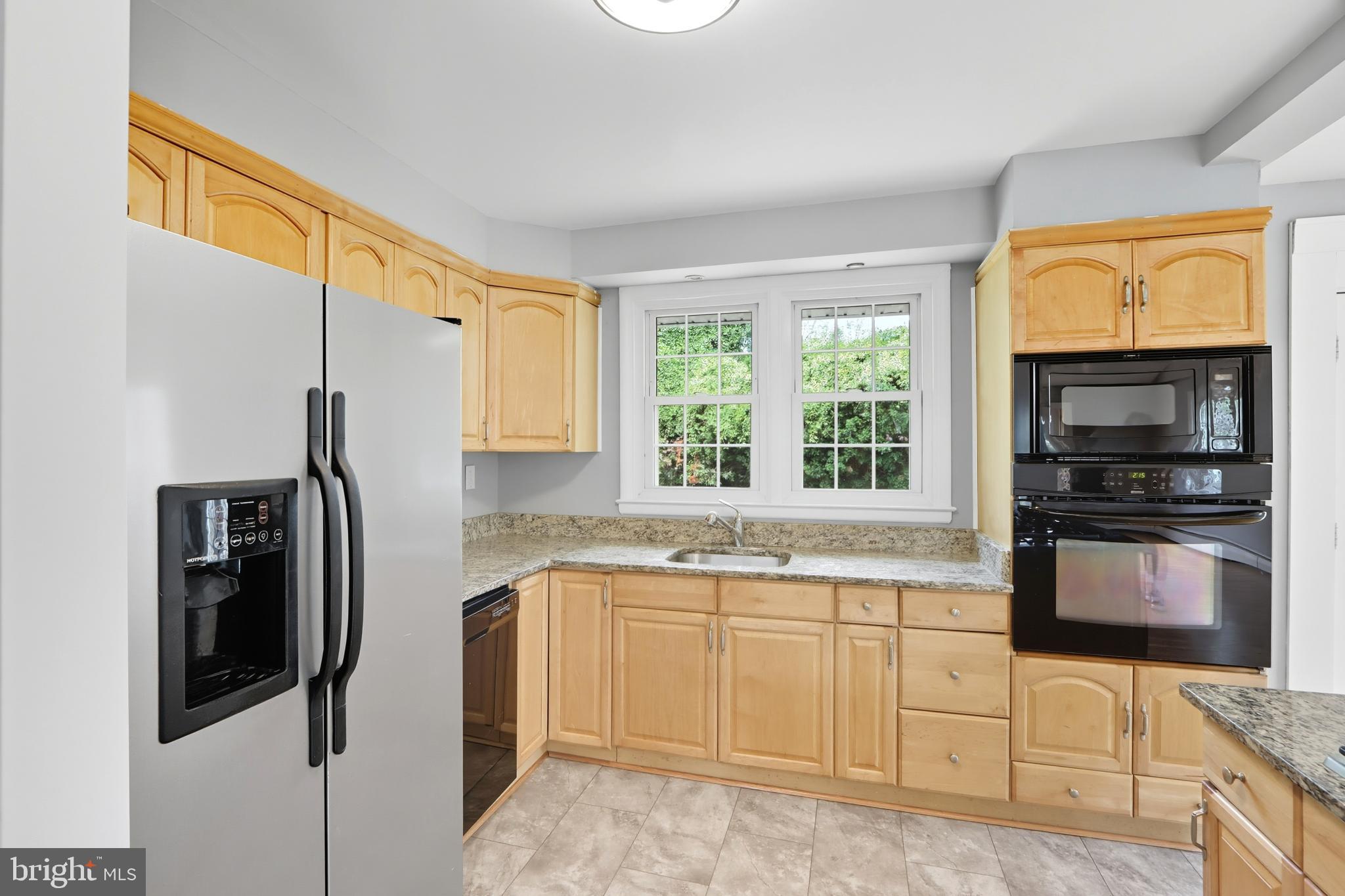 1910 Clifden Road Baltimore, MD 21228 - Photo 10 of 25 Bright kitchen with modern appliances.