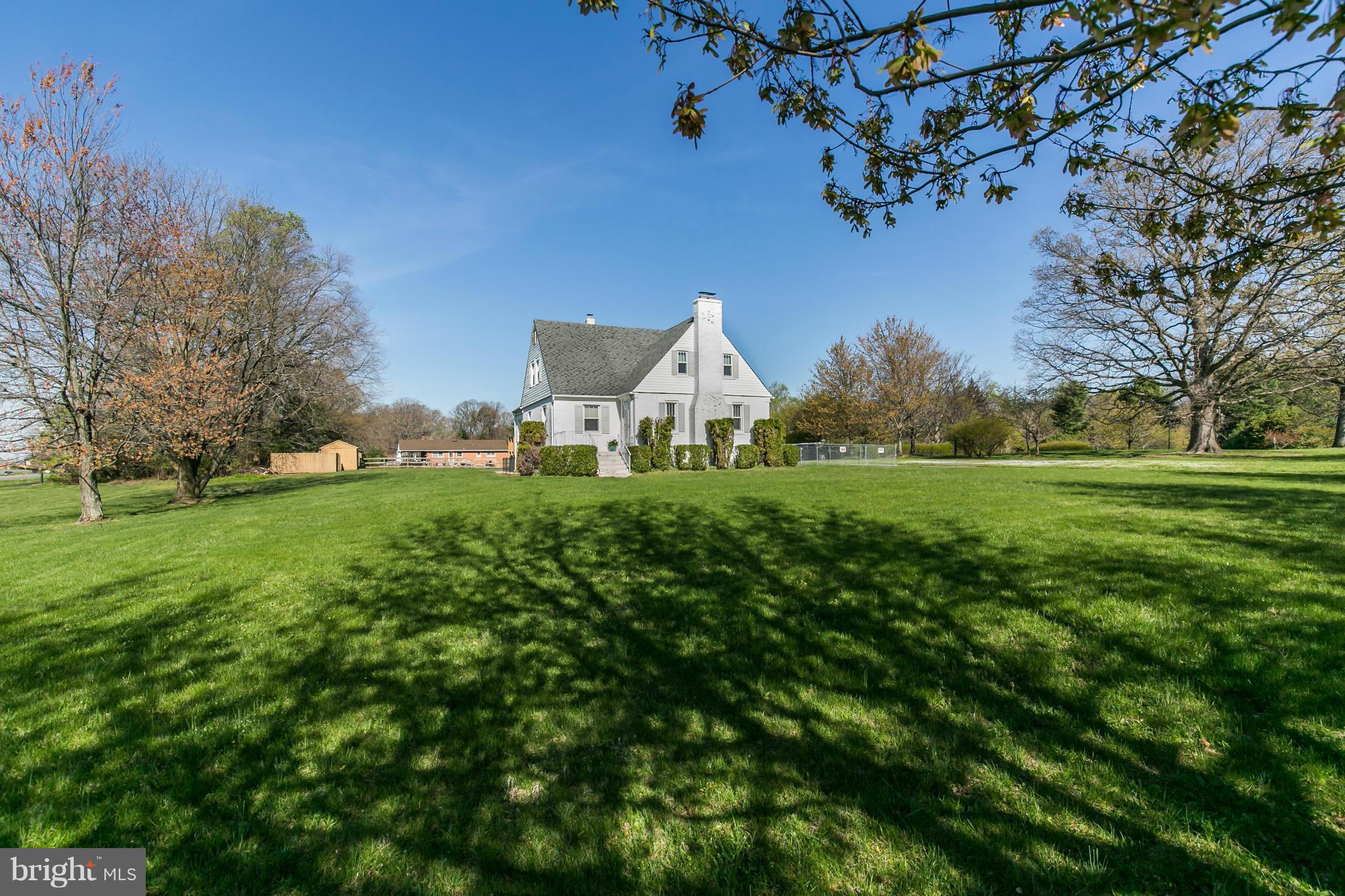 20935 Potomac View Road Sterling, VA 20165 - Photo 2 of 30 a view of a house with a big yard