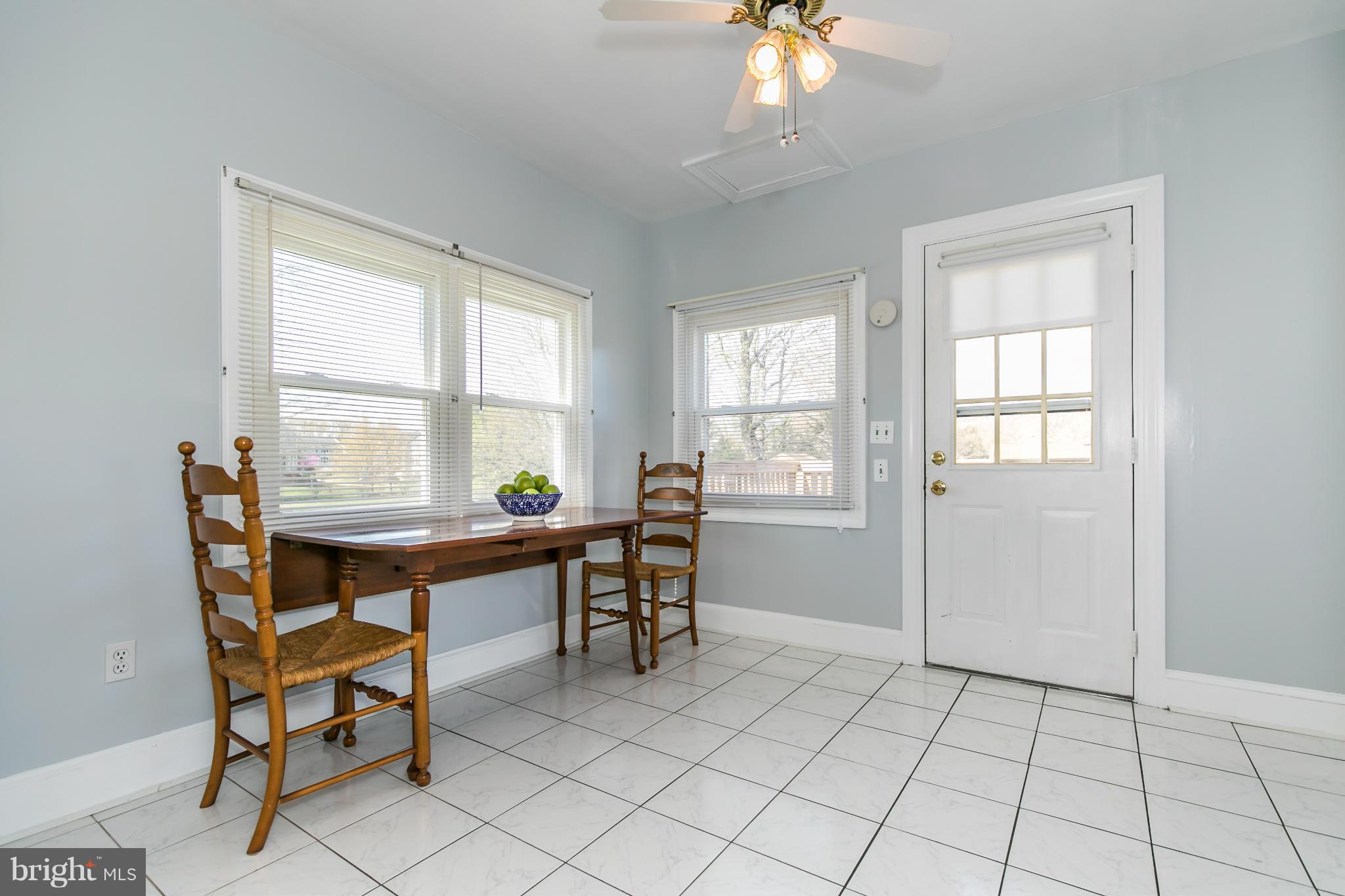 20935 Potomac View Road Sterling, VA 20165 - Photo 14 of 30 a view of a dining room with furniture and window