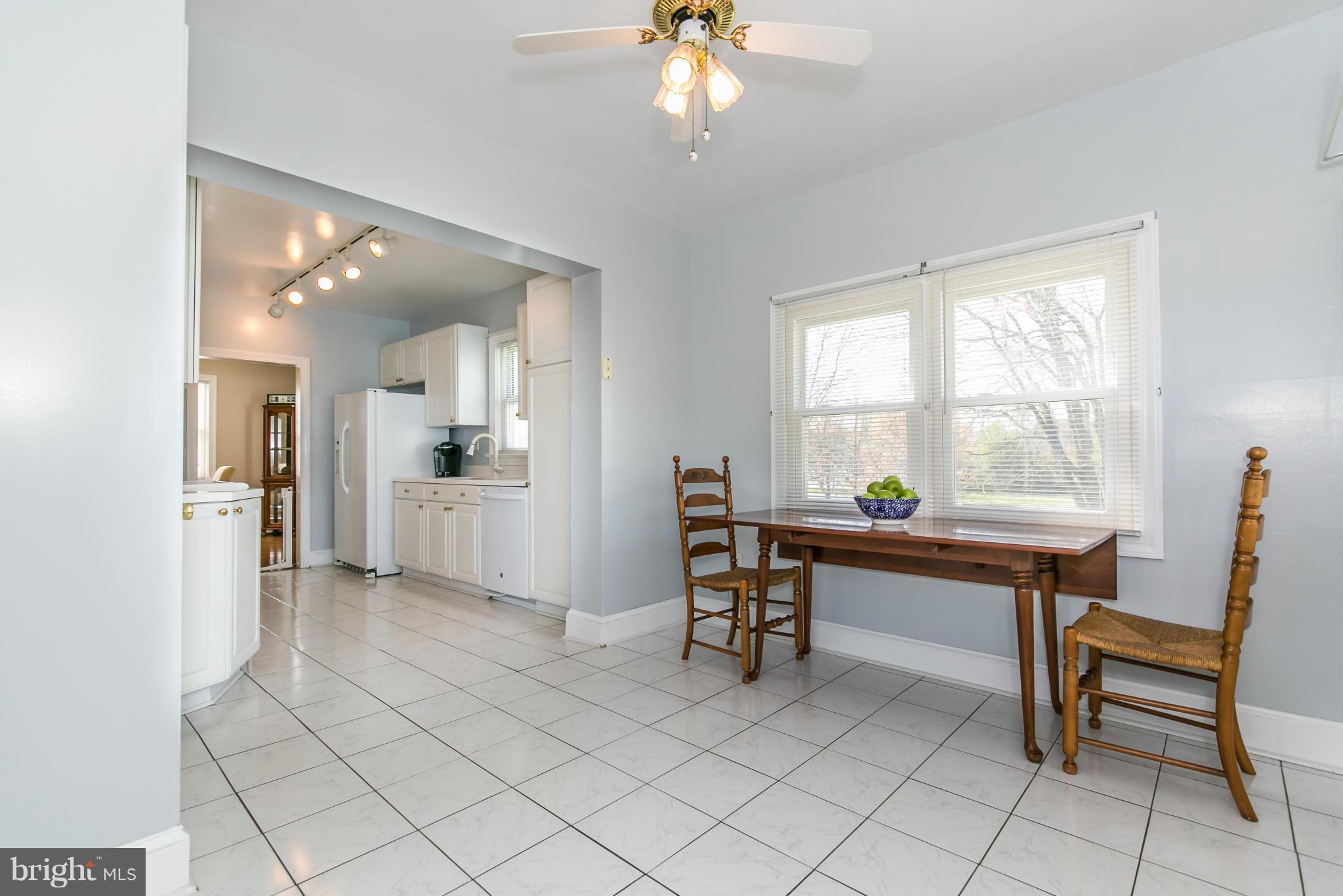 20935 Potomac View Road Sterling, VA 20165 - Photo 16 of 30 a view of a workspace with furniture and a window