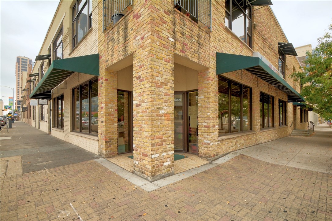 411 Brazos Street, Unit 203 Austin, TX 78701 - Photo 1 of 1 a view of a building with door