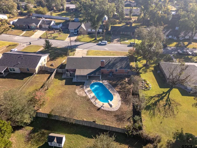 a house view with a swimming pool