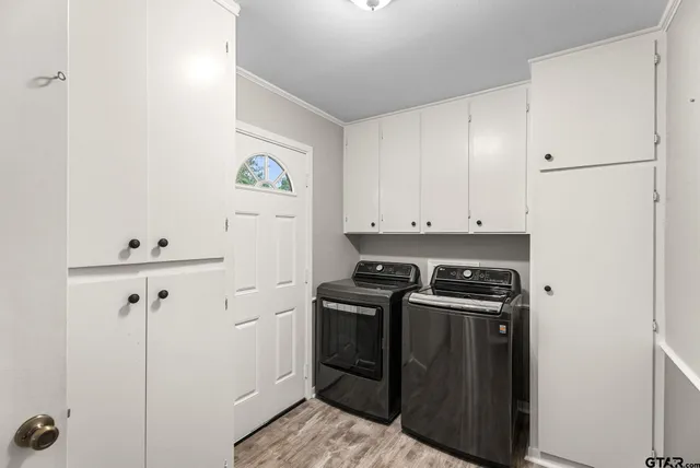 a kitchen with a stove and a refrigerator
