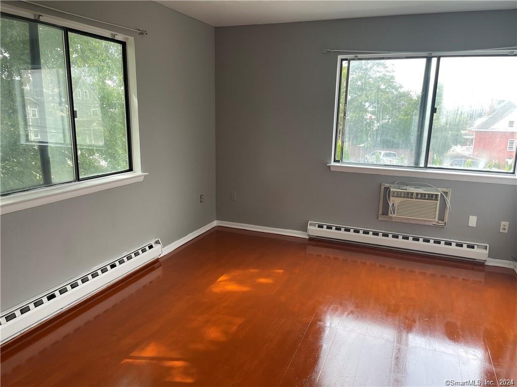 235 Cove Road, Unit 1 Stamford, CT 06902 - Photo 4 of 9 a view of a swimming pool and window