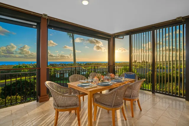 a kitchen with a stove a sink and cabinets