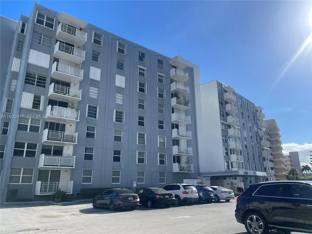 a car parked in front of a building