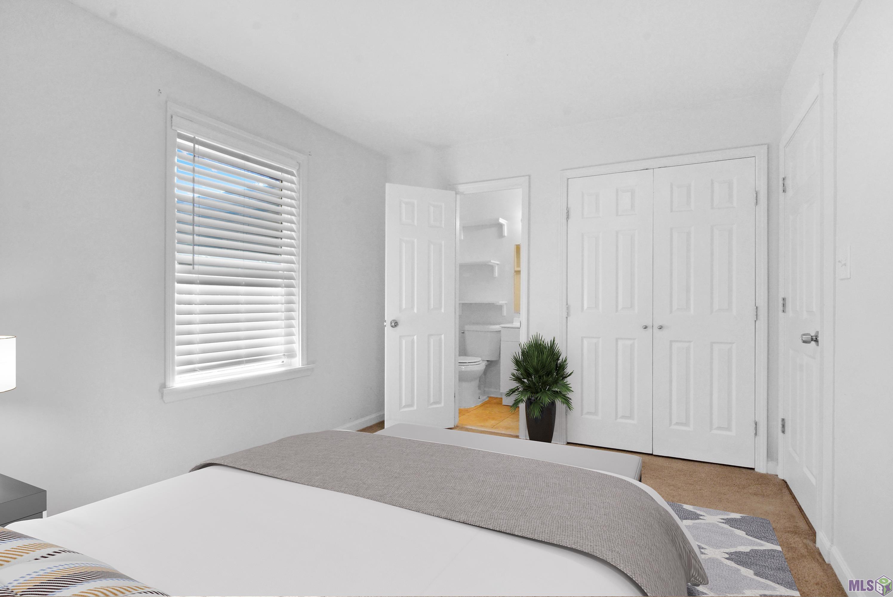 1224 Kline Street Denham Springs, LA 70726 - Photo 11 of 21 Digital Staged - Primary Bedroom