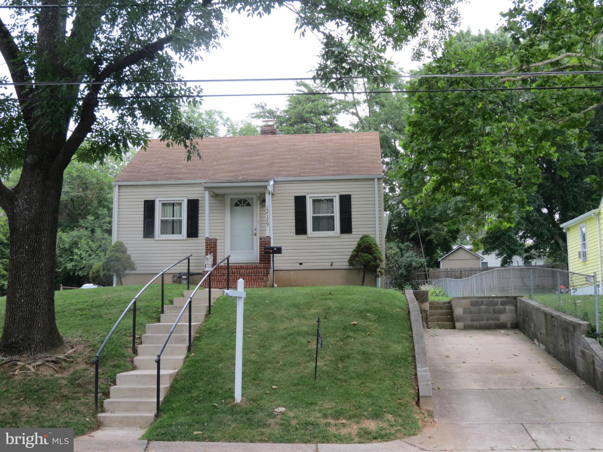 Front view with driveway for 2 cars