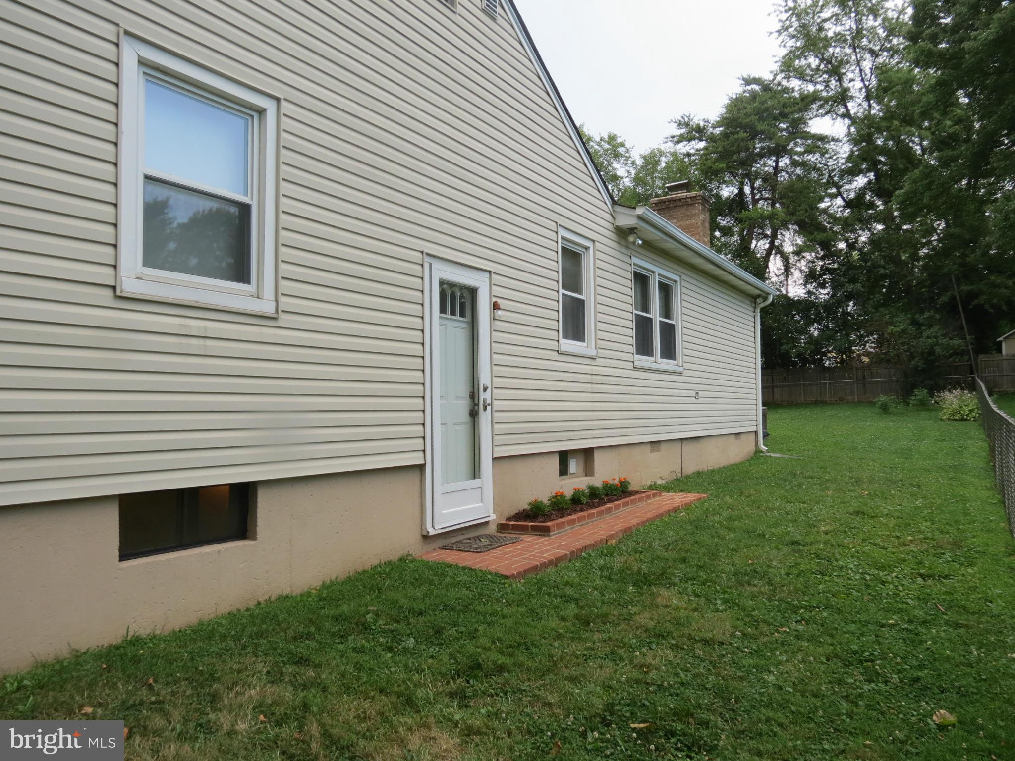 12129 Selfridge Road Silver Spring, MD 20906 - Photo 2 of 28 Right side view door to basement