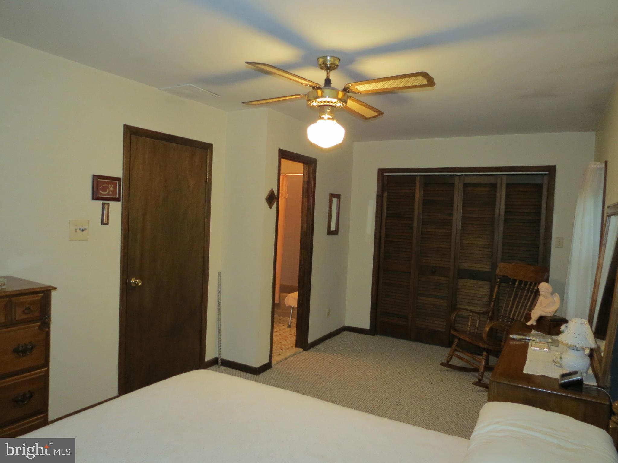 12129 Selfridge Road Silver Spring, MD 20906 - Photo 17 of 28 Master bedroom with huge cedar closet