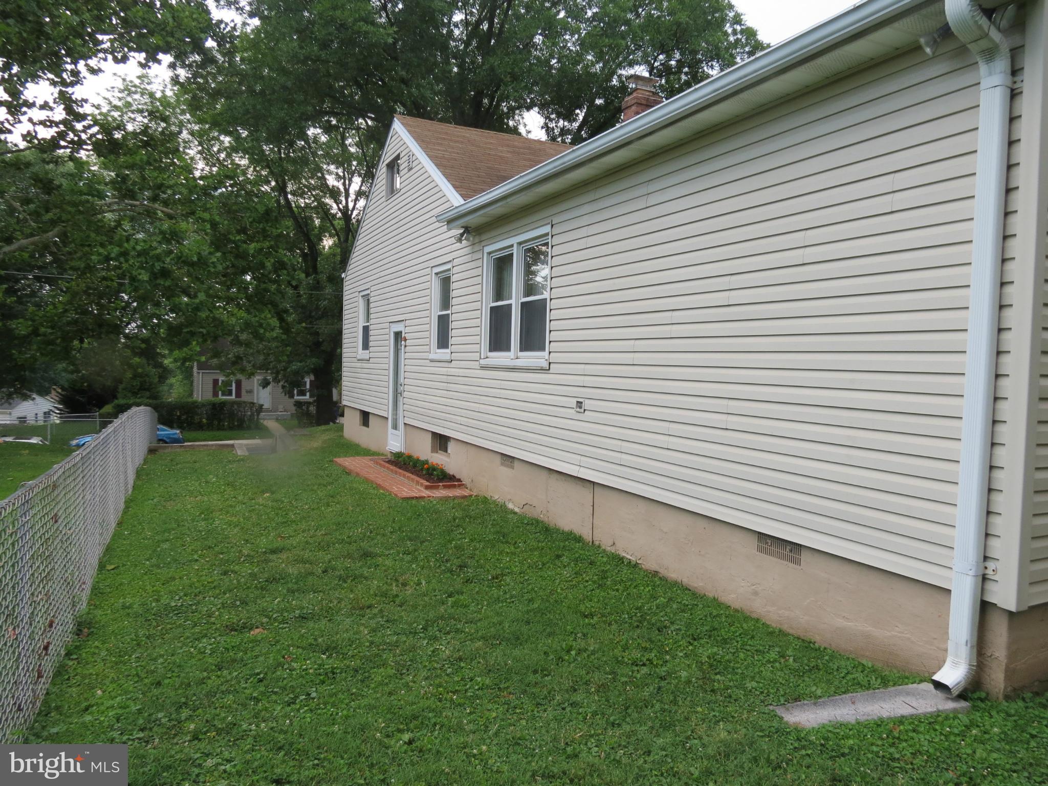12129 Selfridge Road Silver Spring, MD 20906 - Photo 3 of 28 Right side view showing huge addition