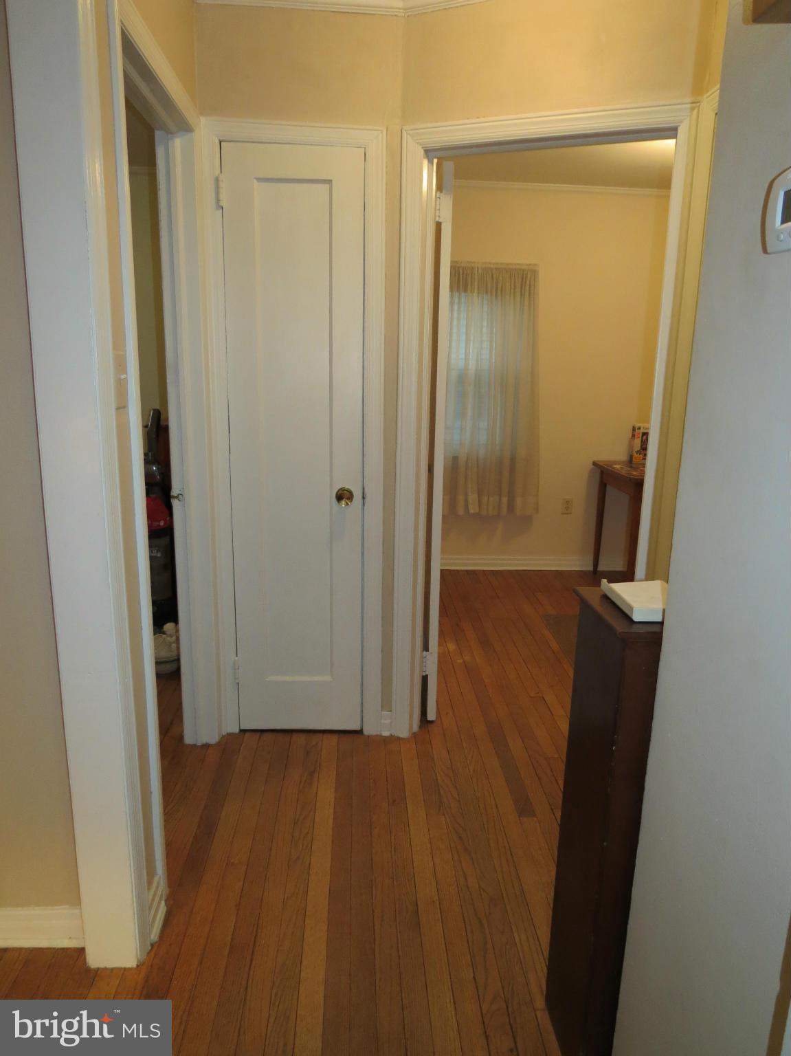 12129 Selfridge Road Silver Spring, MD 20906 - Photo 22 of 28 Hallway between bedrooms with linen closet