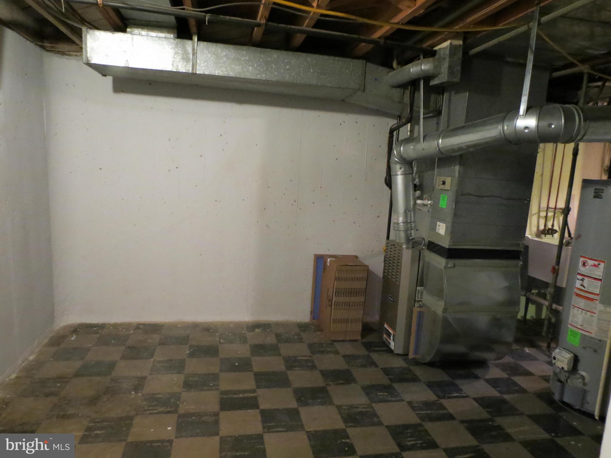 12129 Selfridge Road Silver Spring, MD 20906 - Photo 26 of 28 Basement storage area or space for room