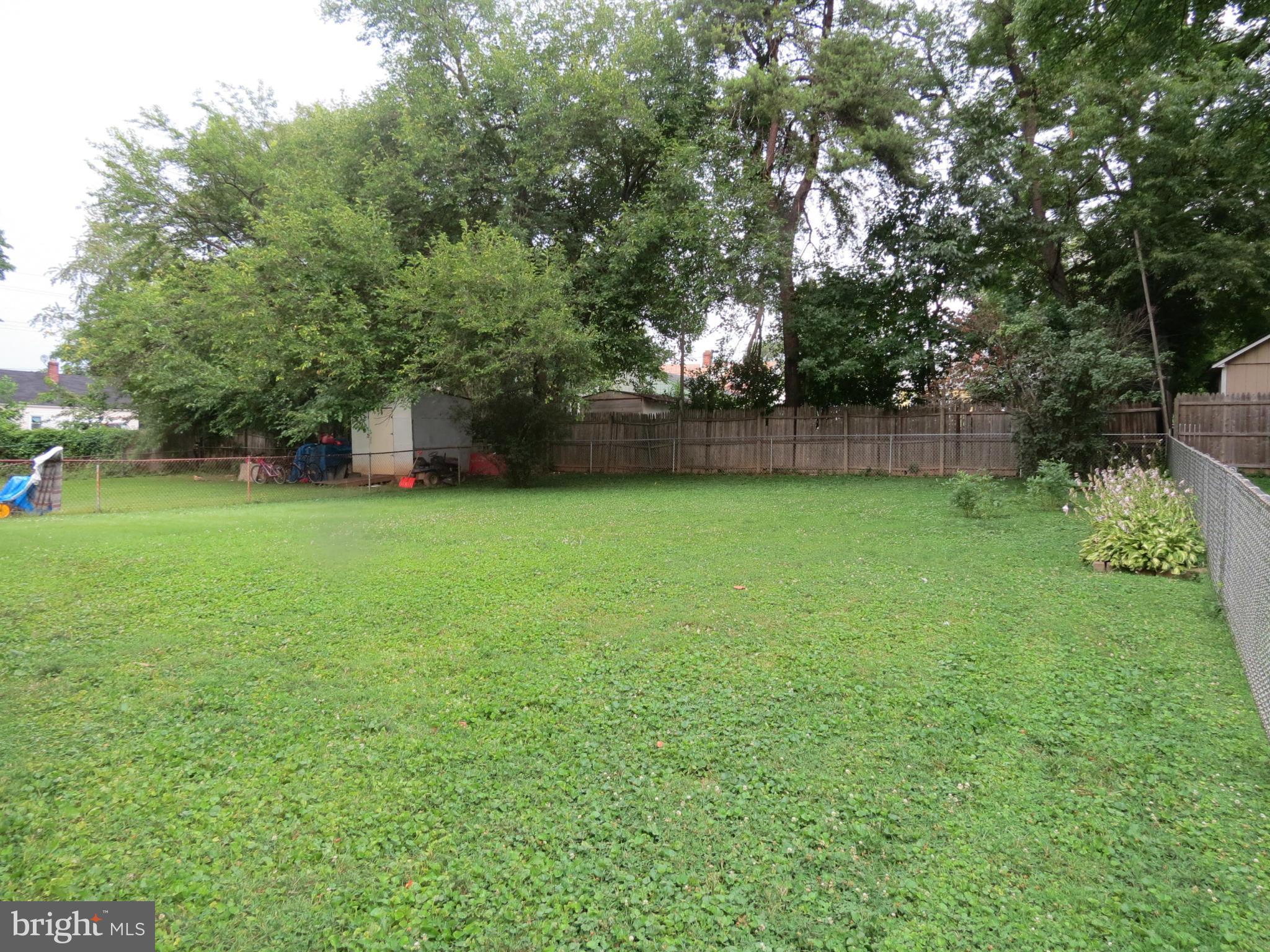 12129 Selfridge Road Silver Spring, MD 20906 - Photo 6 of 28 Beautiful level yard partially fenced