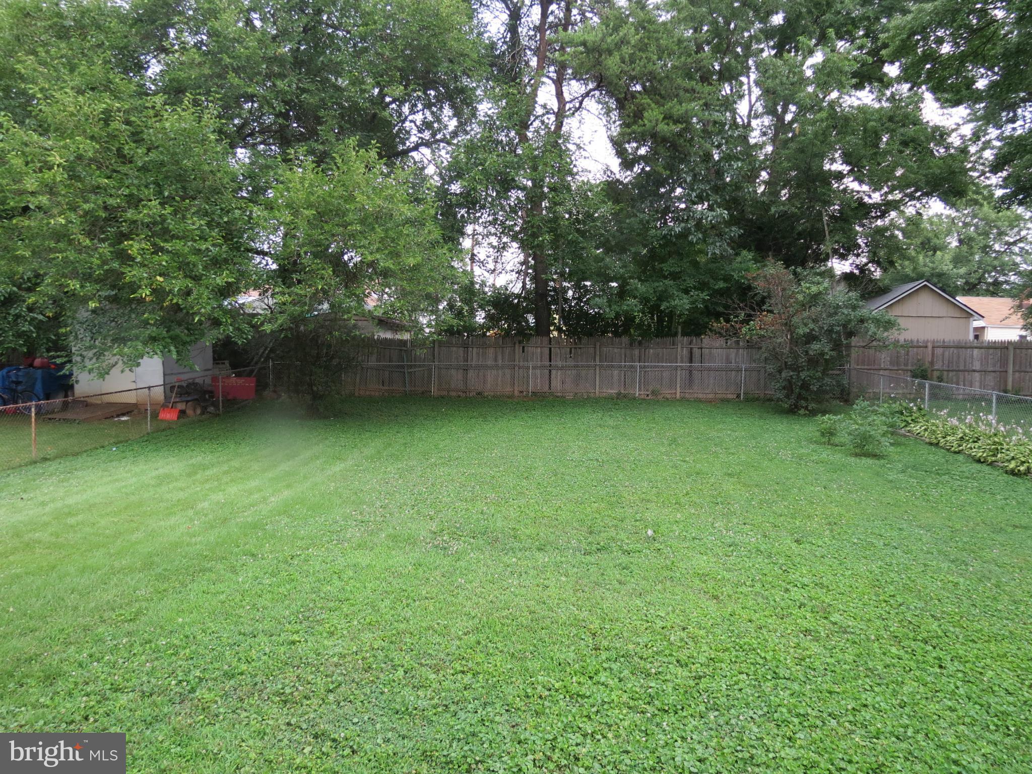 12129 Selfridge Road Silver Spring, MD 20906 - Photo 7 of 28 Spacious level yard room for everything!