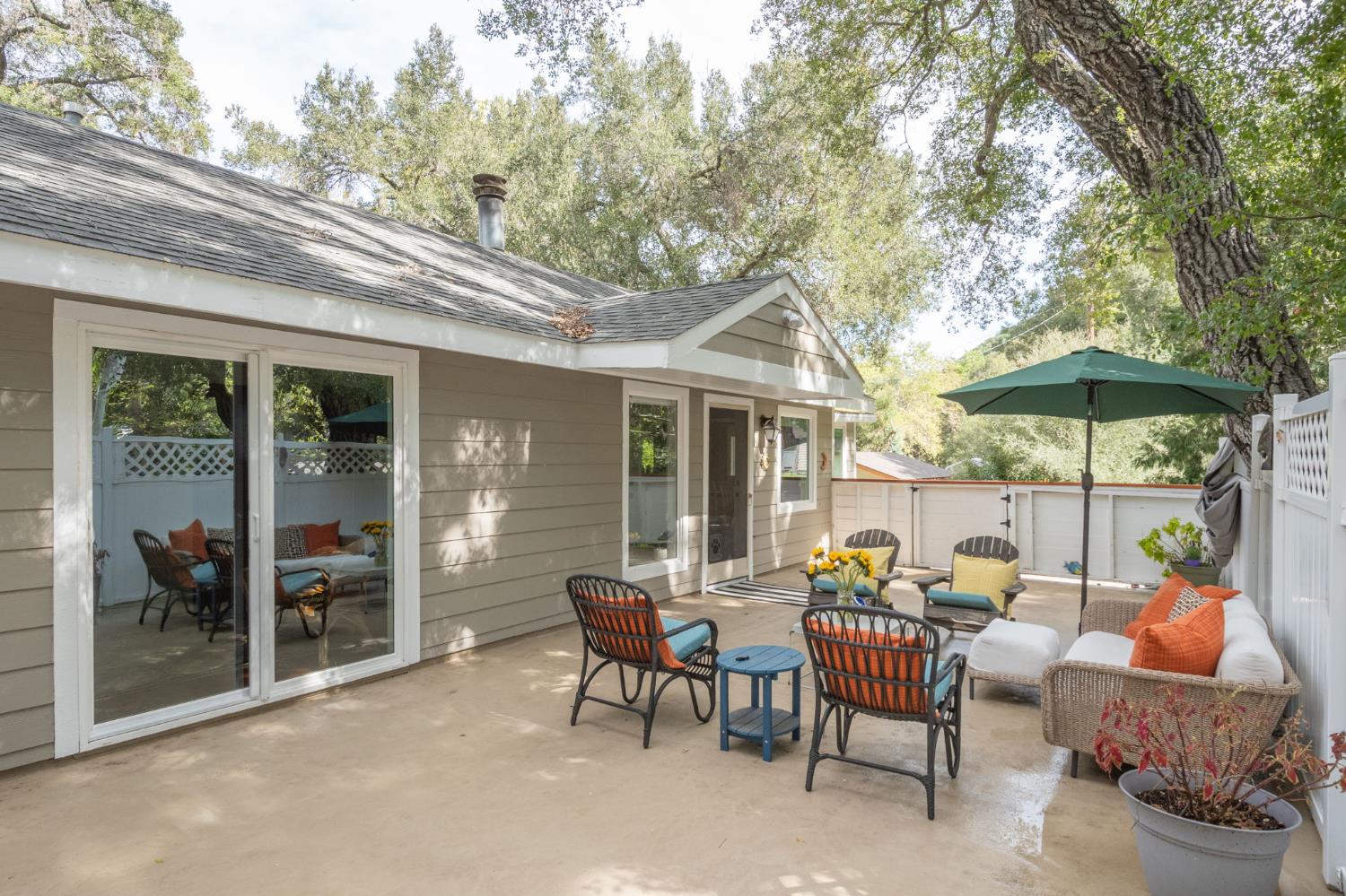 15663 Ojai Road Santa Paula, CA 93060 - Photo 21 of 47 a view of a patio with a table and chairs under an umbrella