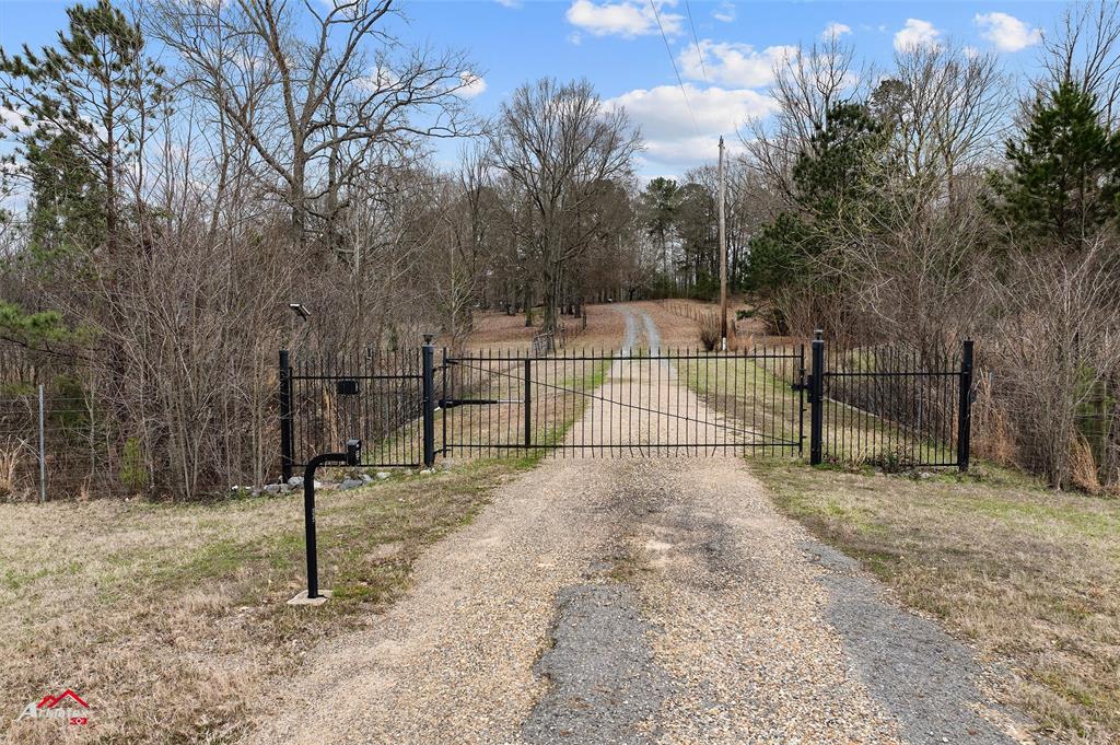 6951 Mira Myrtis Road Ida, LA 71044 - Photo 14 of 32 View of gate featuring fence