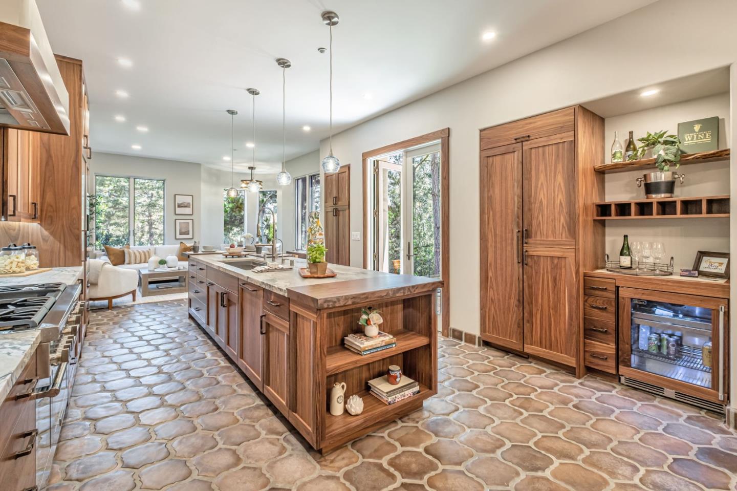 125 Zanzibar Drive Aptos, CA 95003 - Photo 14 of 52 a kitchen with stainless steel appliances granite countertop a stove a sink and a refrigerator