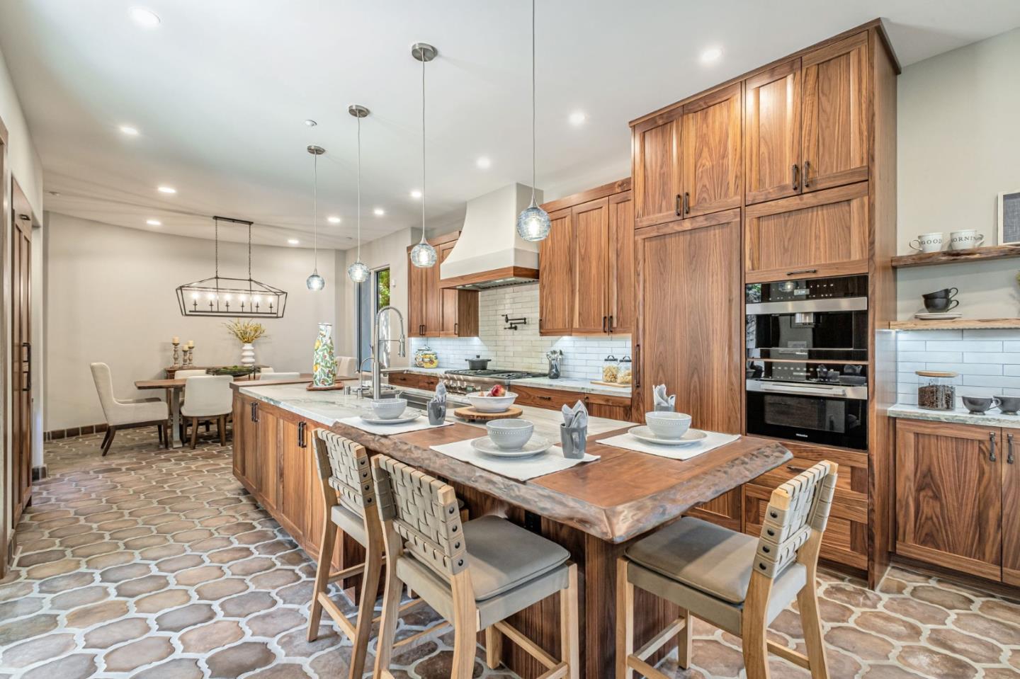 125 Zanzibar Drive Aptos, CA 95003 - Photo 17 of 52 a large kitchen with a table and chairs