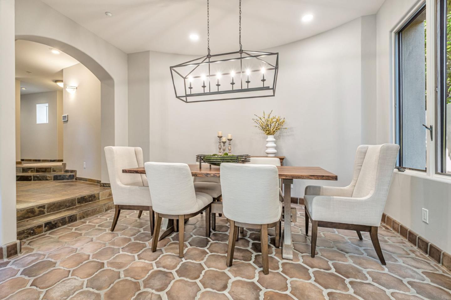 125 Zanzibar Drive Aptos, CA 95003 - Photo 22 of 52 a view of a dining room with furniture and chandelier