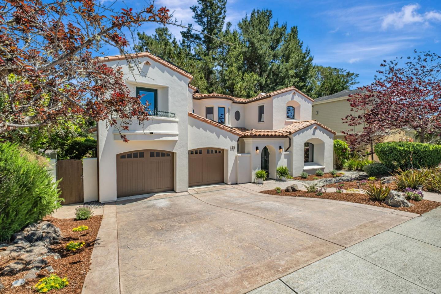 125 Zanzibar Drive Aptos, CA 95003 - Photo 3 of 52 a front view of a house with a garage
