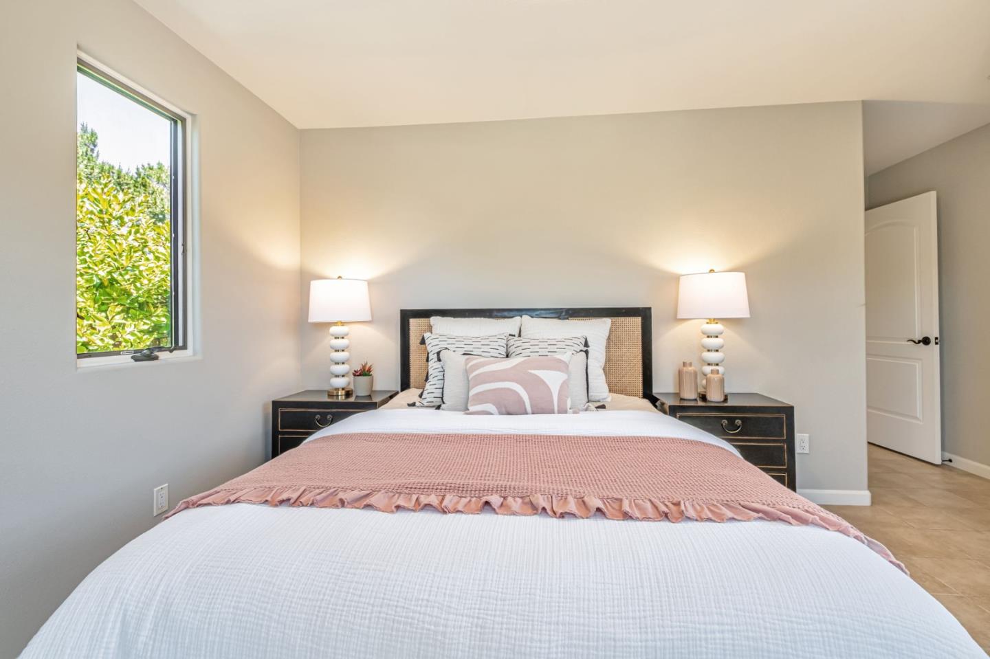 125 Zanzibar Drive Aptos, CA 95003 - Photo 33 of 52 a bedroom with a bed and a window