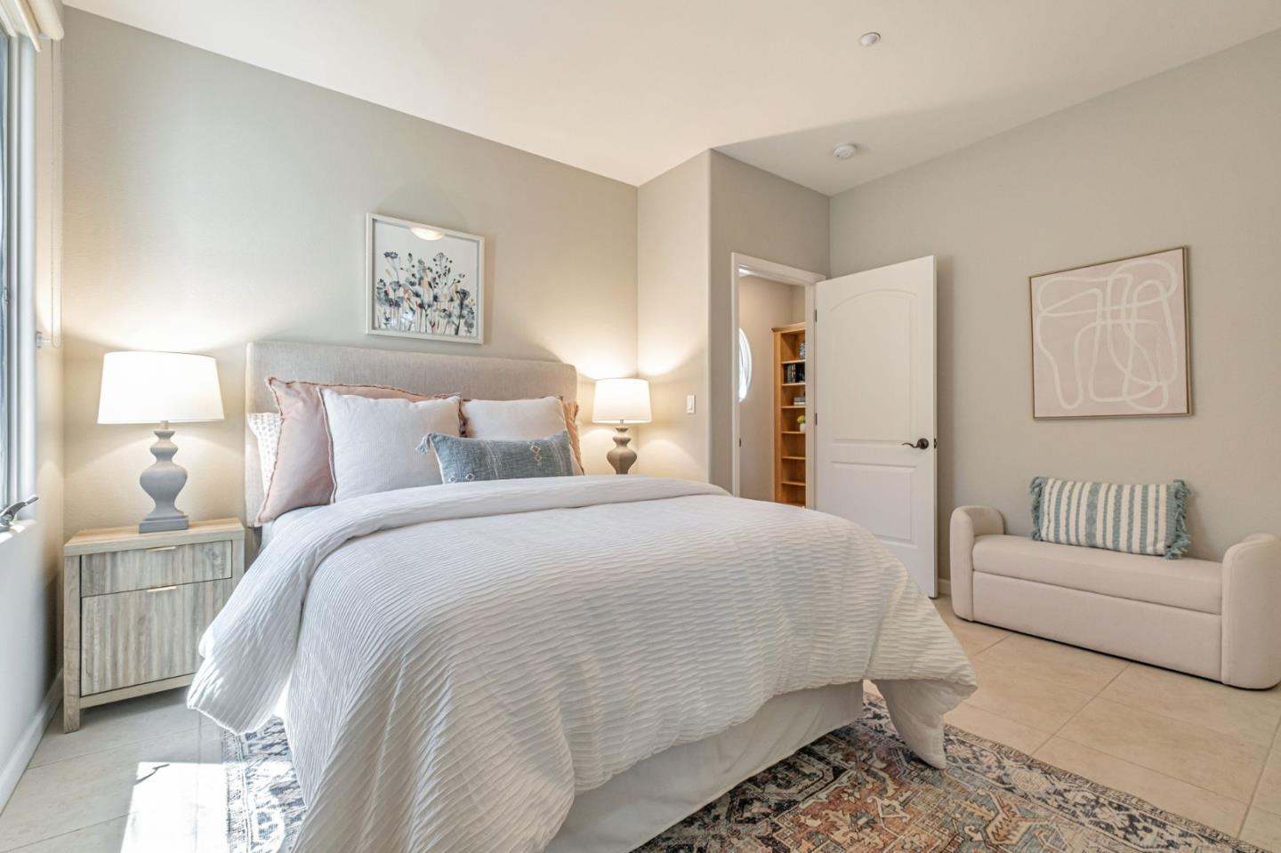 125 Zanzibar Drive Aptos, CA 95003 - Photo 36 of 52 a spacious bedroom with a bed and a couch