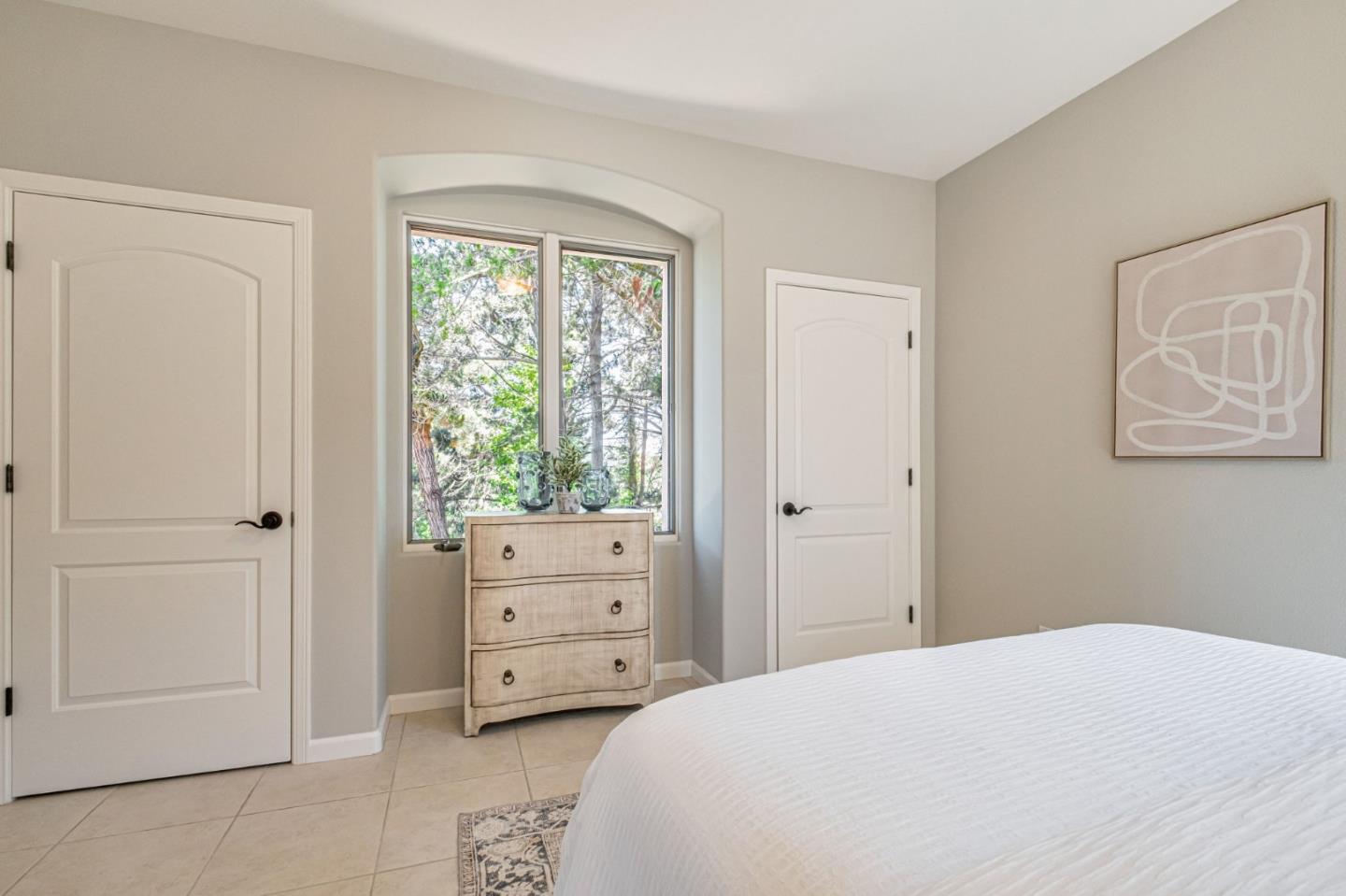 125 Zanzibar Drive Aptos, CA 95003 - Photo 37 of 52 a bedroom with a bed and a window