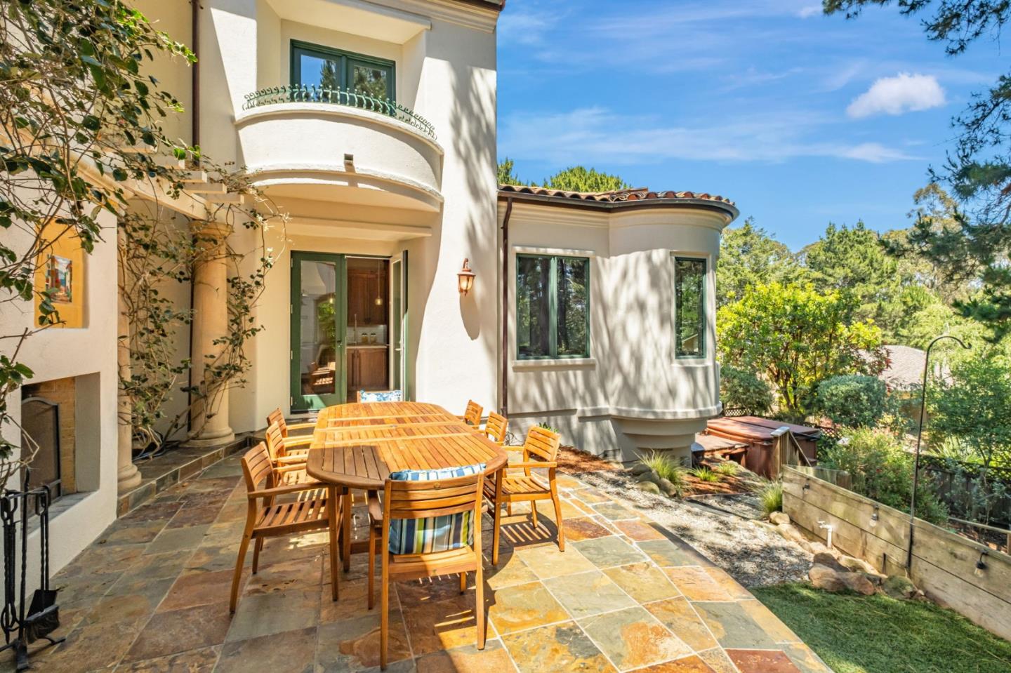 125 Zanzibar Drive Aptos, CA 95003 - Photo 46 of 52 a view of a patio with table and chairs and potted plants