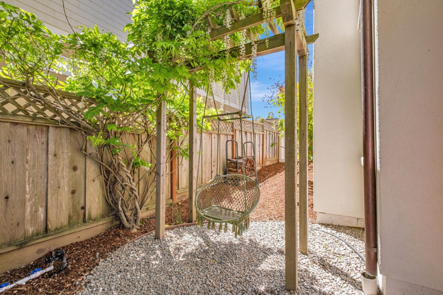 125 Zanzibar Drive Aptos, CA 95003 - Photo 50 of 52 a view of a house with a tree in the background