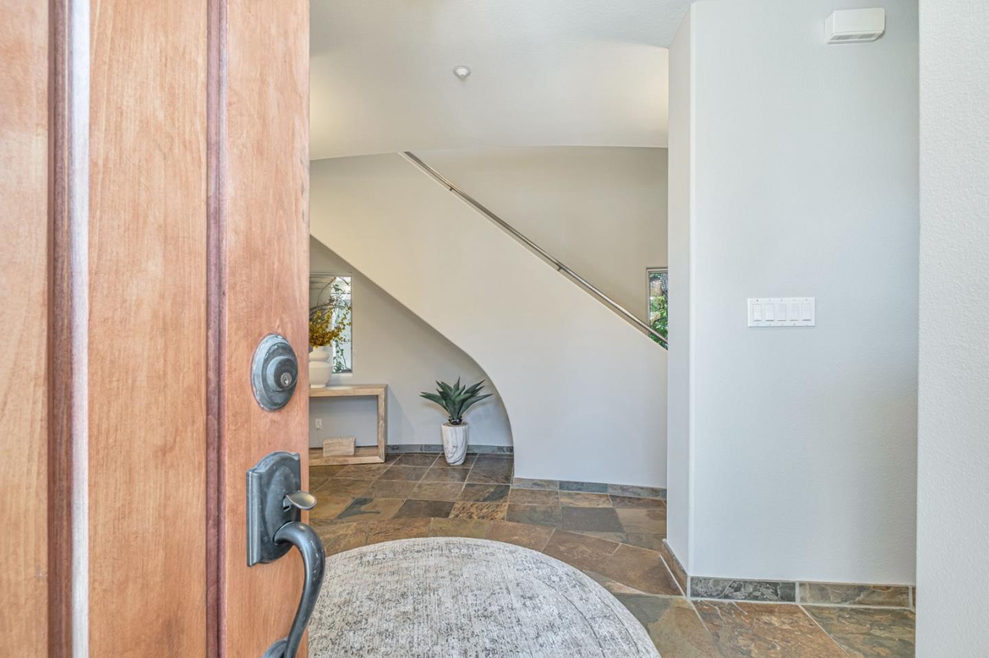 125 Zanzibar Drive Aptos, CA 95003 - Photo 6 of 52 a view of entryway kitchen and hall with wooden floor