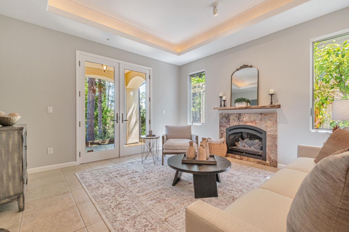 125 Zanzibar Drive Aptos, CA 95003 - Photo 8 of 52 a living room with furniture and a fireplace