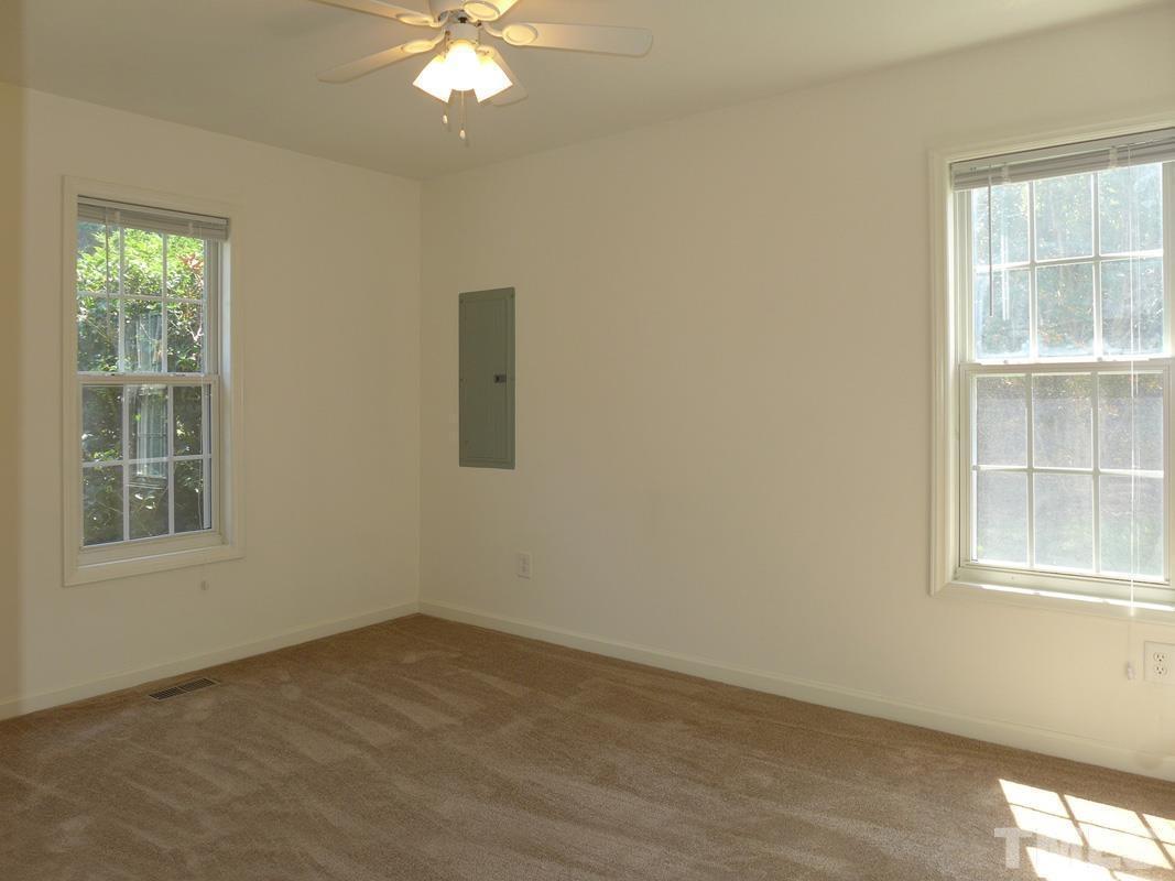 304 Davie Road Carrboro, NC 27510 - Photo 12 of 18 an empty room with a window