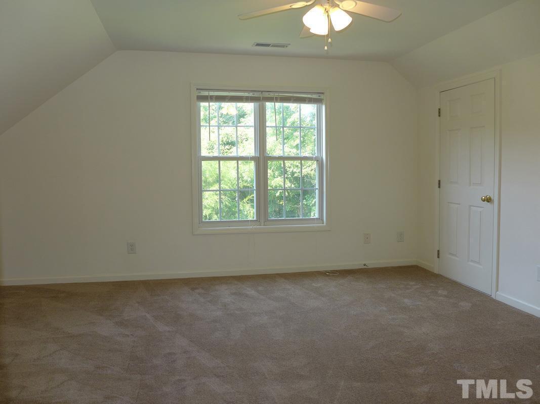 304 Davie Road Carrboro, NC 27510 - Photo 15 of 18 an empty room with a window