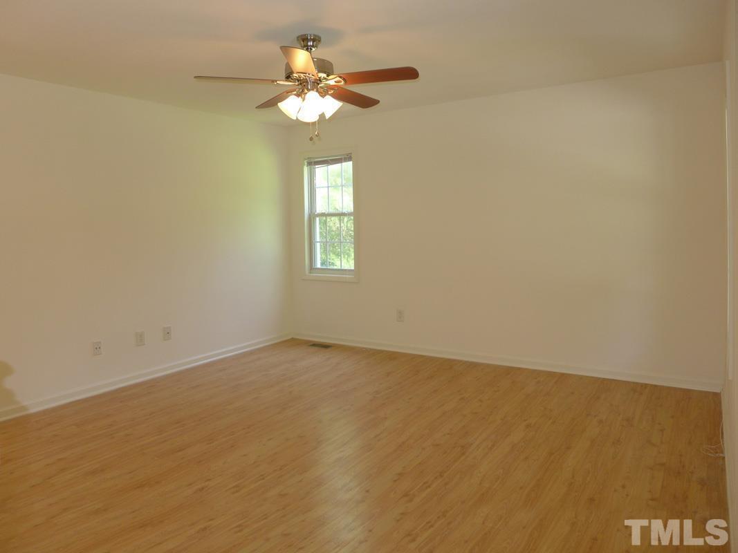 304 Davie Road Carrboro, NC 27510 - Photo 2 of 18 an empty room with a window